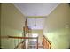 View of a home's stairwell with exposed ceiling and wall damage at 1615 Carbonton Rd, Sanford, NC 27330