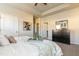 Main bedroom with tray ceiling, dresser, and large bed at 170 Vega Loop, Sanford, NC 27330