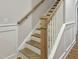 Wooden staircase with white railing and banister at 203 Pond Vw Ct # 1, Fuquay Varina, NC 27526