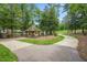 Brick pathways lead to a shaded community gazebo and sitting area at 209 Pond View Ct # 4, Fuquay Varina, NC 27526