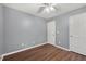 Simple bedroom with wood-look floors and two closets at 2504 Patton Lane Ln, Franklinton, NC 27525