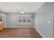 Bright dining area with wood flooring and large window at 2504 Patton Lane Ln, Franklinton, NC 27525