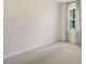 Spacious bedroom with neutral walls and plush carpeting at 255 Moore Creek Dr, Fuquay Varina, NC 27526