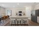 Modern kitchen with stainless steel appliances and granite countertops at 255 Moore Creek Dr, Fuquay Varina, NC 27526