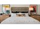 Main bedroom with king-size bed and stylish decor at 255 Moore Creek Dr, Fuquay Varina, NC 27526