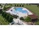 Community swimming pool with a water slide at 268 Babbling Brook Dr, Clayton, NC 27520