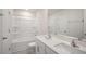 Bathroom boasts a double vanity, tub and shower combo at 273 Hanging Elm Ln, Fuquay Varina, NC 27526