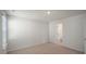 Bedroom with carpet and access to a full bathroom at 273 Hanging Elm Ln, Fuquay Varina, NC 27526