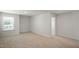 Spacious bedroom with neutral walls, carpet, and window at 273 Hanging Elm Ln, Fuquay Varina, NC 27526
