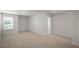Bright bedroom with neutral walls, carpet and window, offering ample space at 273 Hanging Elm Ln, Fuquay Varina, NC 27526