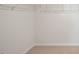 Large walk-in closet with wire shelving for storage at 273 Hanging Elm Ln, Fuquay Varina, NC 27526