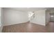 Spacious living room featuring wood floors and staircase at 273 Hanging Elm Ln, Fuquay Varina, NC 27526