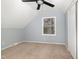 Simple bedroom with neutral carpet and a ceiling fan at 2874 Beulahtown Rd, Kenly, NC 27542