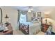 Bedroom with a metal bed frame and hardwood floors at 304 Homestead Rd. Rd, Chapel Hill, NC 27516
