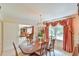 Bright dining room featuring a large table and access to living room at 304 Homestead Rd. Rd, Chapel Hill, NC 27516