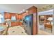 Well-equipped kitchen with wood cabinets and granite countertops at 304 Homestead Rd. Rd, Chapel Hill, NC 27516