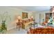 Bright and airy living room featuring a comfortable sofa and armchairs at 304 Homestead Rd. Rd, Chapel Hill, NC 27516