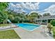 Inviting in-ground pool with patio furniture and slide at 304 Homestead Rd. Rd, Chapel Hill, NC 27516