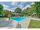 Relaxing rectangular pool with slide and patio furniture at 304 Homestead Rd. Rd, Chapel Hill, NC 27516