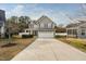 Charming two-story home with a two-car garage and a landscaped front yard at 3805 Hamlin Ct, Raleigh, NC 27616