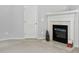 Cozy fireplace with white mantel and decorative accents at 3805 Hamlin Ct, Raleigh, NC 27616