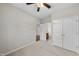 Bedroom with plush carpeting, ceiling fan, and private bathroom at 4331 Karlbrook Ln, Raleigh, NC 27616