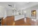 Bright living room with hardwood floors and a fireplace at 4331 Karlbrook Ln, Raleigh, NC 27616