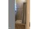 Stand-up shower with gray tile surround at 4357 Sunscape Ln, Raleigh, NC 27613