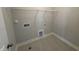 Laundry room with shelving and space for washer/dryer at 453 Edison Rail Ln, Knightdale, NC 27545