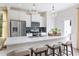 Kitchen with stainless steel appliances and white cabinetry at 4904 Caddis Bend, Raleigh, NC 27604