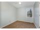 Bright bedroom with neutral walls and carpeted floor at 5612 Plum Nearly Ct, Raleigh, NC 27610