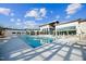 Stunning pool area with clubhouse and plenty of lounge chairs at 708 Longleaf Grove Ln # Virginia104, Knightdale, NC 27545