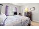 Bedroom with a double bed, dresser and large window at 901 Townes Park St, Wake Forest, NC 27587