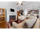 Open living room and kitchen with fireplace at 901 Townes Park St, Wake Forest, NC 27587