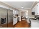 Modern kitchen with stainless steel appliances and white cabinets at 103 Lakeside Farm Road Rd, Zebulon, NC 27597