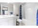 Clean bathroom with tub and white vanity at 10650 Bedfordtown Dr, Raleigh, NC 27614