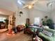 Living room with cozy furniture arrangement, wood floors, and a decorated Christmas tree at 1120 Northview St, Garner, NC 27529