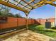 Backyard with pergola, raised garden beds, and AC unit at 1309 Silver Dr, Mebane, NC 27302