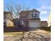 Two-story home with attached garage and driveway at 1309 Silver Dr, Mebane, NC 27302