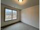 Inviting bedroom with carpeted floors and a window overlooking the outdoors at 136 S Mistflower St, Clayton, NC 27520