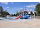 Community splash pad with colorful slides, water features, and a shaded area at 136 S Mistflower St, Clayton, NC 27520