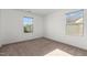 Bright bedroom with neutral walls and carpet at 154 Alamosa Pl, Cary, NC 27519