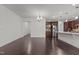 Spacious dining room with hardwood floors and chandelier at 154 Alamosa Pl, Cary, NC 27519