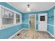 View of the dining area and the adjacent laundry room at 2416 Wilkins St, Burlington, NC 27217