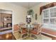 Breakfast area with round table, wicker chairs, and natural light at 421 Weathergreen Dr, Raleigh, NC 27615