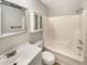 Clean and bright bathroom with a shower/tub combo, white vanity, and updated fixtures at 5038 Flint Ridge Pl, Raleigh, NC 27609