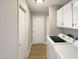 Laundry room with Samsung washer and dryer at 5038 Flint Ridge Pl, Raleigh, NC 27609