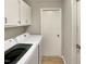 Laundry room with Samsung washer and dryer at 5038 Flint Ridge Pl, Raleigh, NC 27609