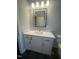 Elegant bathroom vanity with a marble countertop and modern fixtures at 601 Vannoy Pl, Fuquay Varina, NC 27526