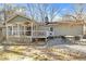 Backyard with screened porch, patio furniture, and gravel patio at 713 Cooke Rd, Louisburg, NC 27549